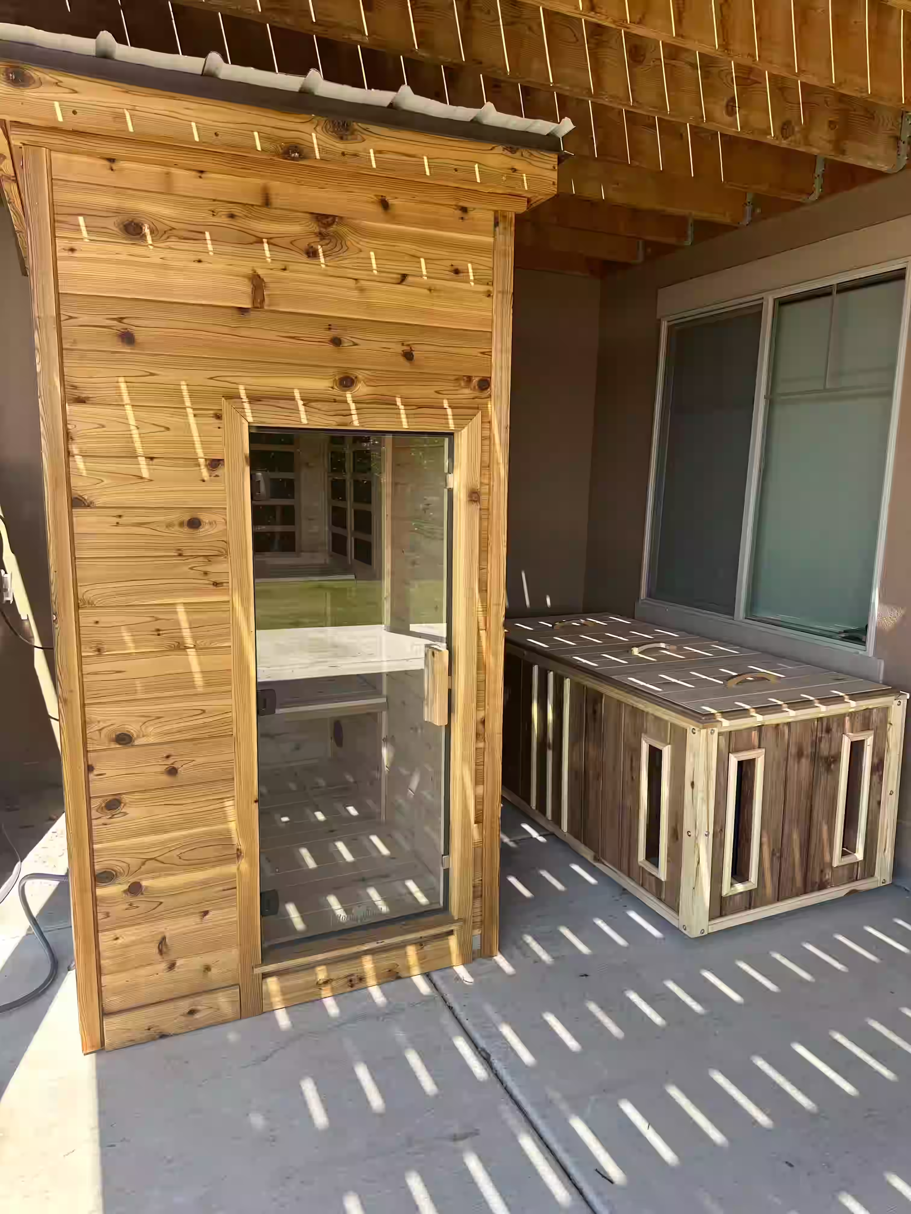 Portrait image showing a steam room and cold plunge side by side